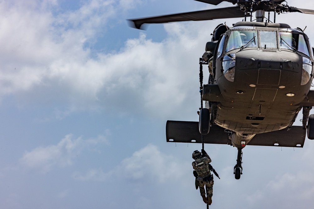 7th Special Operations Group (Airborne) Soldiers lead fast rope training for 8 partner nations