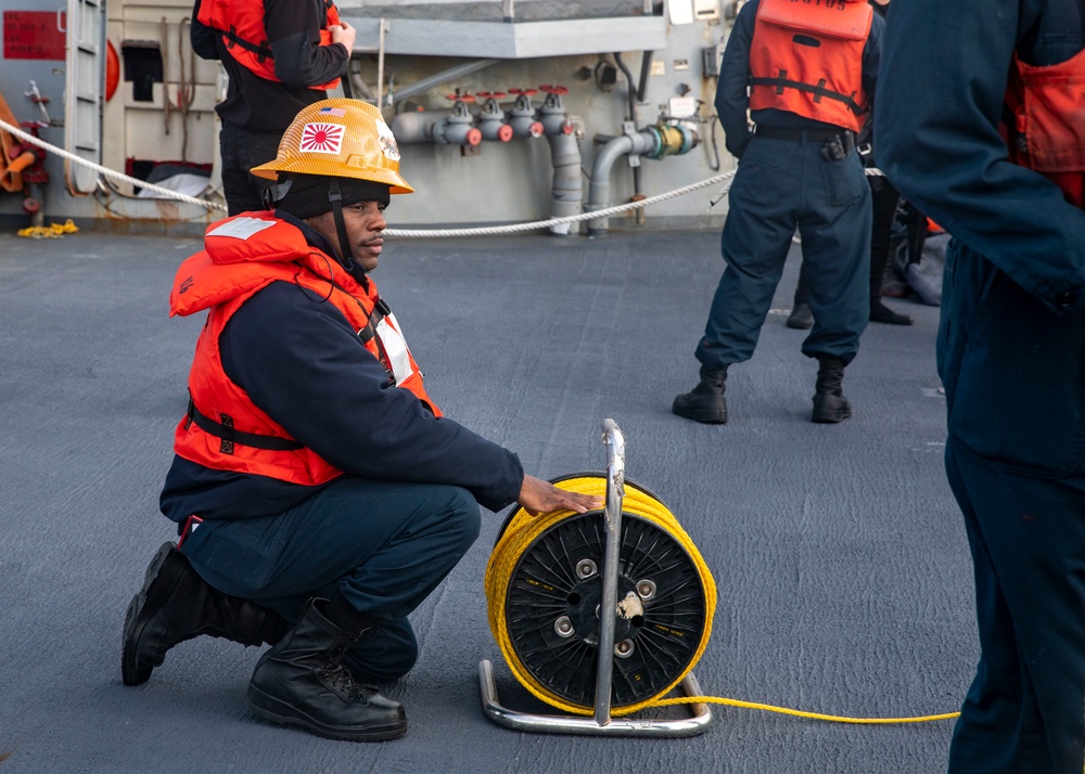 Sailors Conduct Man Overboard Drill Aboard USS Dewey, April 23