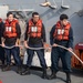 Sailors Conduct Man Overboard Drill Aboard USS Dewey, April 23