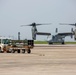 U.S. Marines with VMM-265 transport HIMARS ammunition pods with MV-22B Osprey