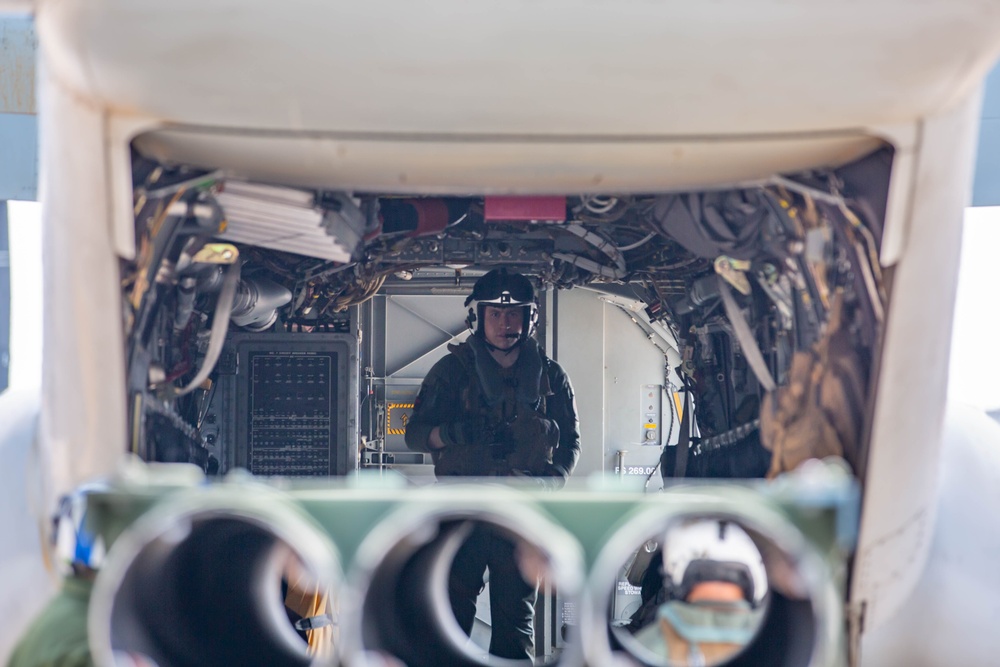 U.S. Marines with VMM-265 transport HIMARS ammunition pods with MV-22B Osprey