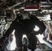 U.S. Marines with VMM-265 transport HIMARS ammunition pods with MV-22B Osprey