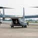 U.S. Marines with VMM-265 transport HIMARS ammunition pods with MV-22B Osprey