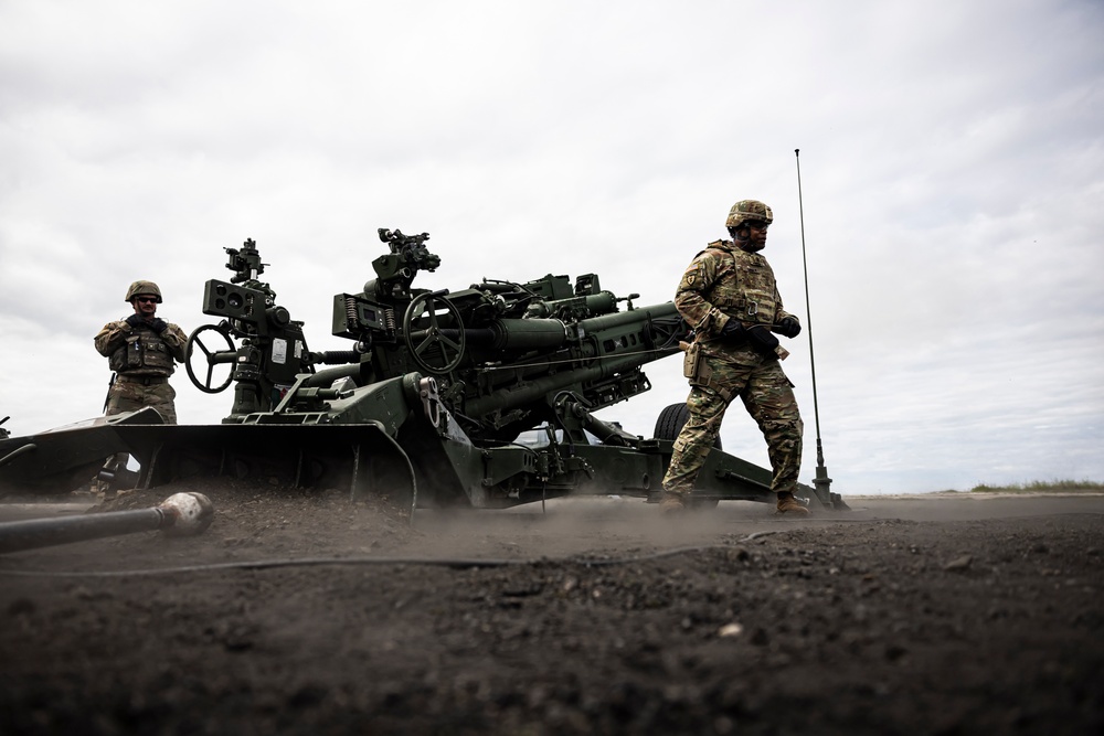 Multinational field artillery fire mission