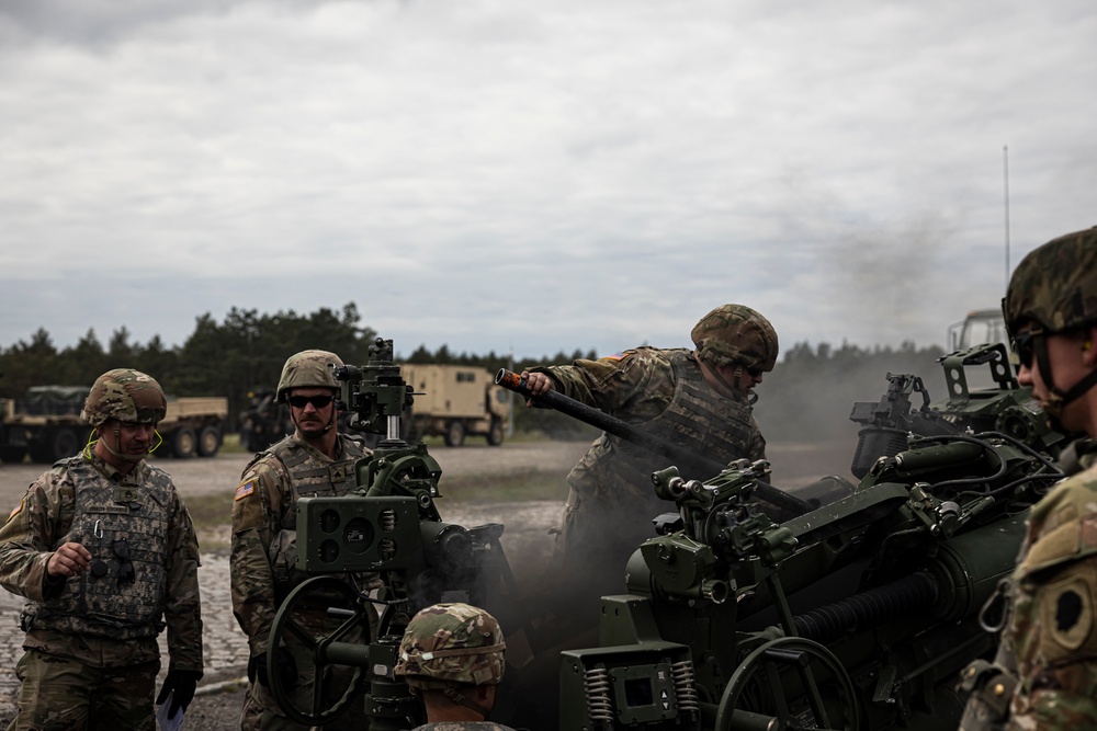 Multinational field artillery fire mission