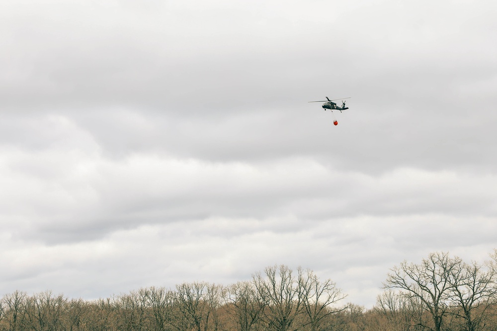 34th ECAB Conducts Helicopter Water Bucket Training with MNDNR