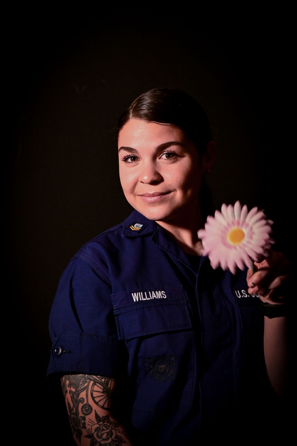 Petty Officer 2nd Class Shelby Williams poses for a Women's History Month photoshoot