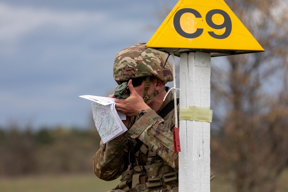 Spc. Kenton Skiba shoots an azimuth