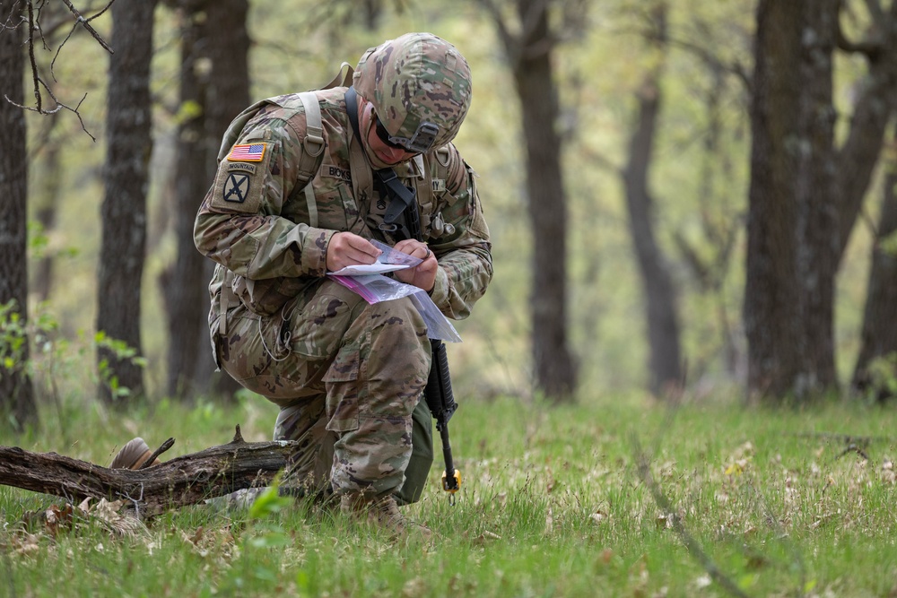 Staff Sgt. Nicholas Brooks consults his map