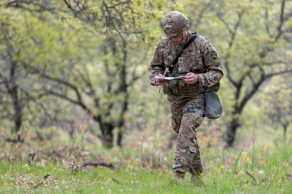 Sgt. Cody Tolbert consults his map