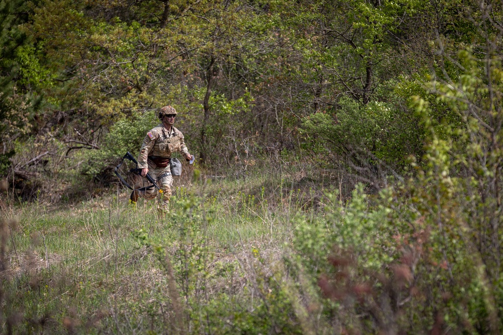 Spc. Gabriel Hizey runs to his next point