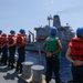 Sailors aboard the USS Howard conduct a replenishment-at-sea with the USNS John Ericsson in the South China Sea