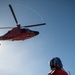 Coast Guard MH-60 Jayhawk and MH-65 Dolphin helicopter aircrews train near North Head Lighthouse in Cape Disappointment State Park, Washington