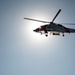 Coast Guard MH-60 Jayhawk and MH-65 Dolphin helicopter aircrews train near North Head Lighthouse in Cape Disappointment State Park, Washington