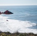 Coast Guard MH-60 Jayhawk and MH-65 Dolphin helicopter aircrews train near North Head Lighthouse in Cape Disappointment State Park, Washington