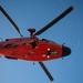 Coast Guard MH-60 Jayhawk and MH-65 Dolphin helicopter aircrews train near North Head Lighthouse in Cape Disappointment State Park, Washington