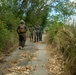 Members of the U.S. and Mexican marines, Antigua army, Suriname army, Belize army, Royal Bahamas Defence Force, and Jamaican army establish security during raid