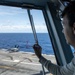 Air department Sailors track aircraft aboard George Washington flight deck