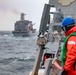 USS Ralph Johnson conducts replenishment at sea.