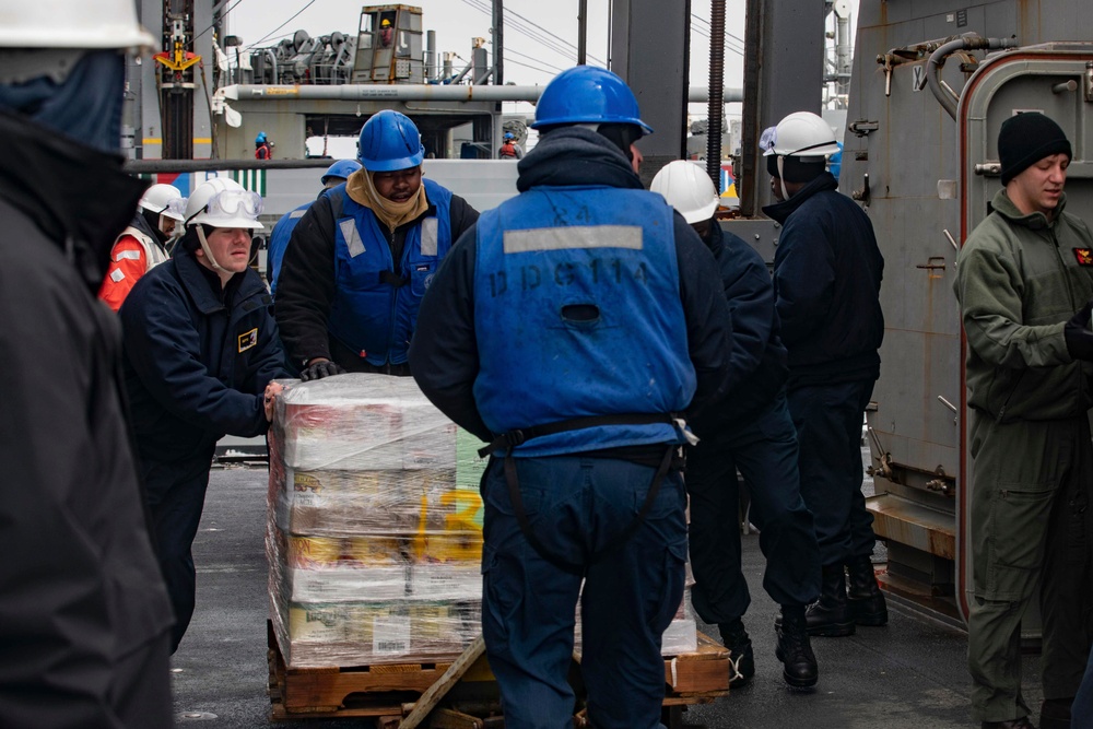 USS Ralph Johnson conducts replenishment at sea.