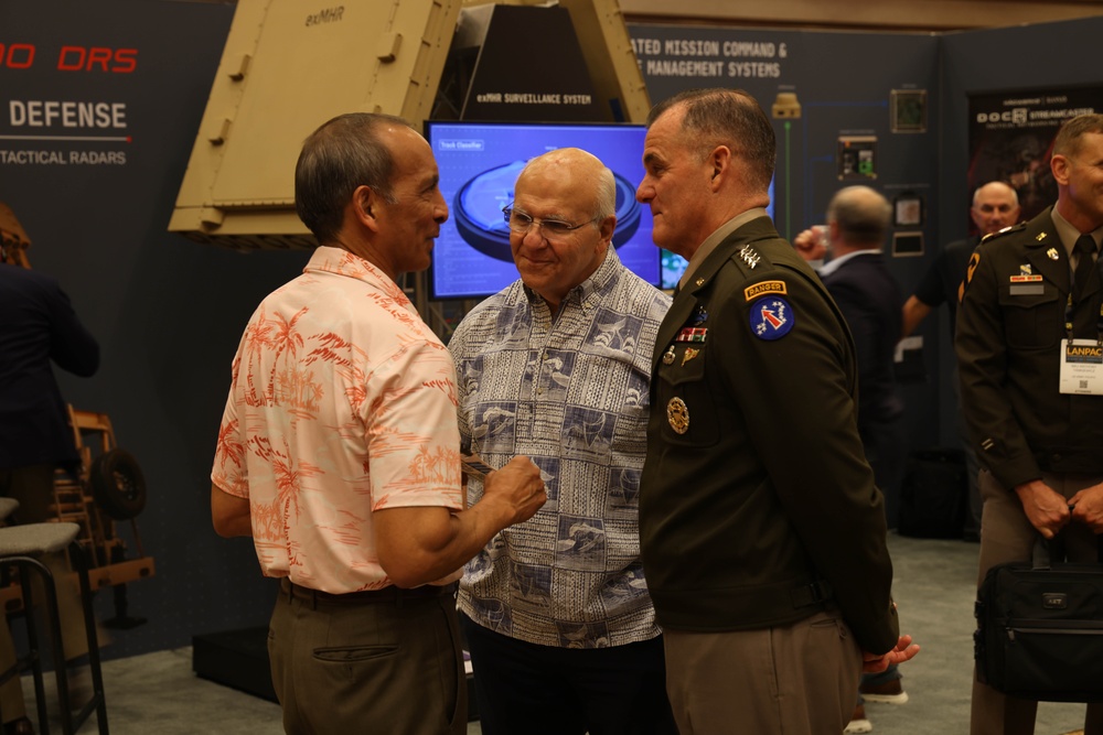 US Army Pacific Commanding General Charles A. Fylnn takes Mayor of Honolulu Rick Blangiardi for a walk through of LANPAC 2024