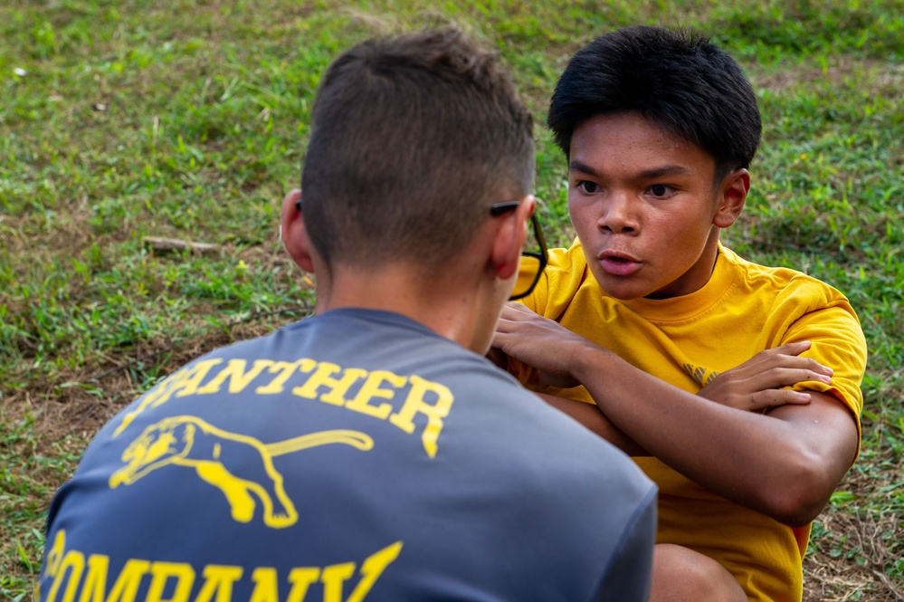 USS Frank Cable Sailors Volunteer During Guam High School’s Navy Junior Officers’ Training Corps PRT