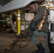 Marines conduct aviation maintenance aboard Abraham Lincoln