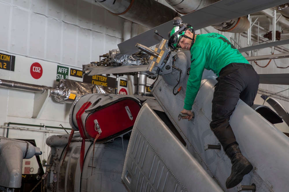 Abraham Lincoln Sailors conduct aviation maintenance