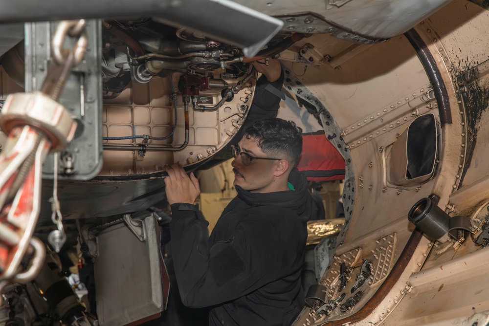 Abraham Lincoln Sailors conduct aviation maintenance