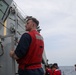 Sailors aboard the USS Howard conduct flight quarters in the South China Sea