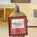 CW4 Cameron with his award