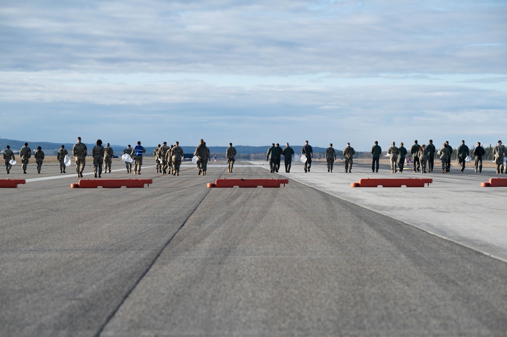 354th Airmen clean the flightline