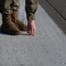 354th Airmen clean the flightline