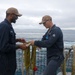 Sailors aboard the USS Howard conduct a sea and anchor detail in Okinawa, Japan