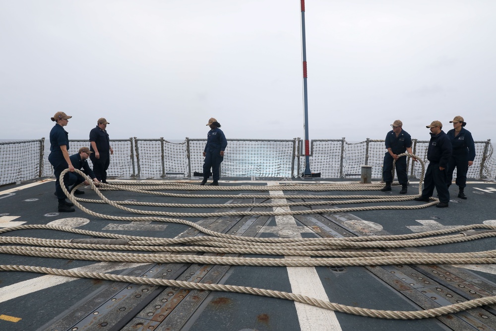 Sailors aboard the USS Howard conduct a sea and anchor detail in Okinawa, Japan