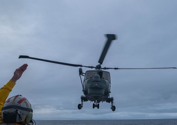 U.S. Coast Guard works with Brazilian navy helicopter crew