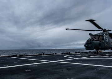 U.S. Coast Guard works with Brazilian navy helicopter crew
