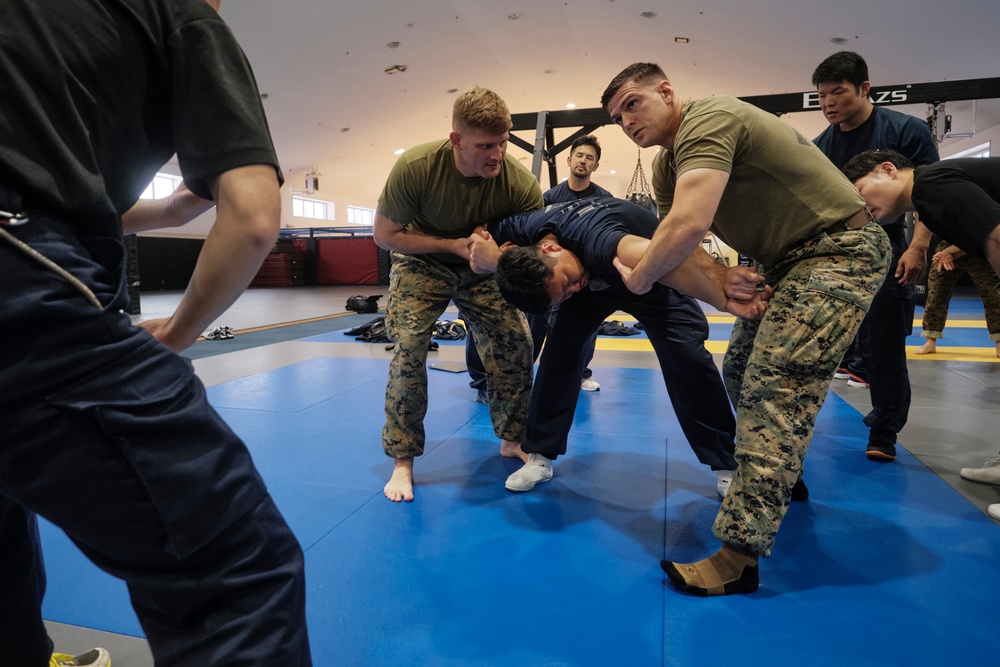 FASTPAC Marines, Immigration Agents participate in martial arts exchange