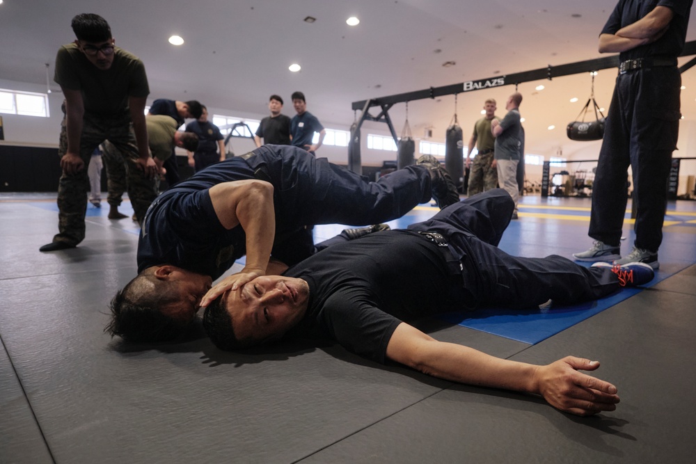 FASTPAC Marines, Immigration Agents participate in martial arts exchange
