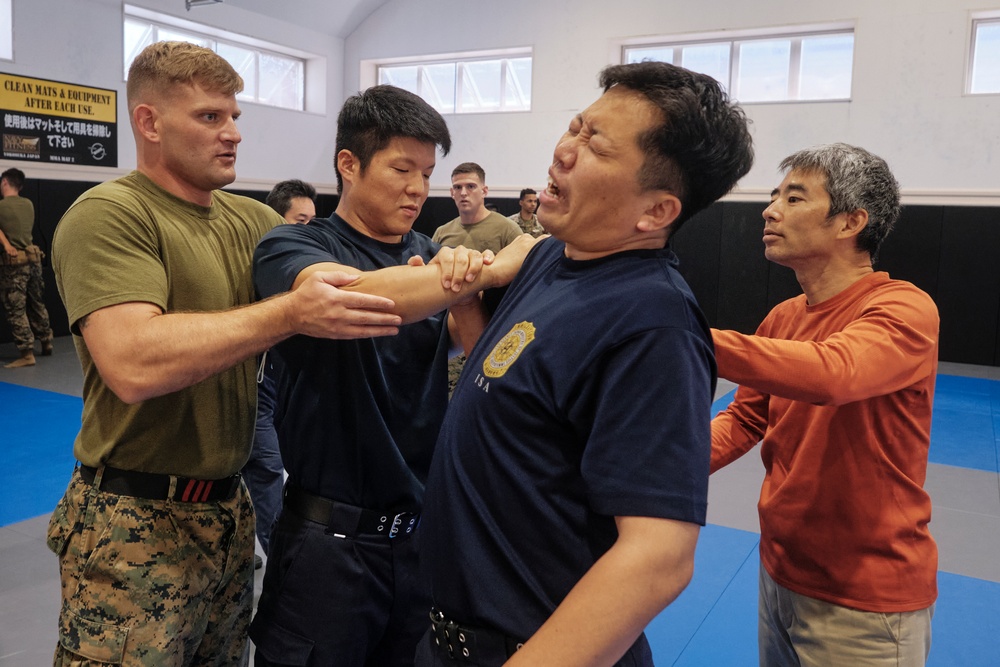 FASTPAC Marines, Immigration Agents participate in martial arts exchange