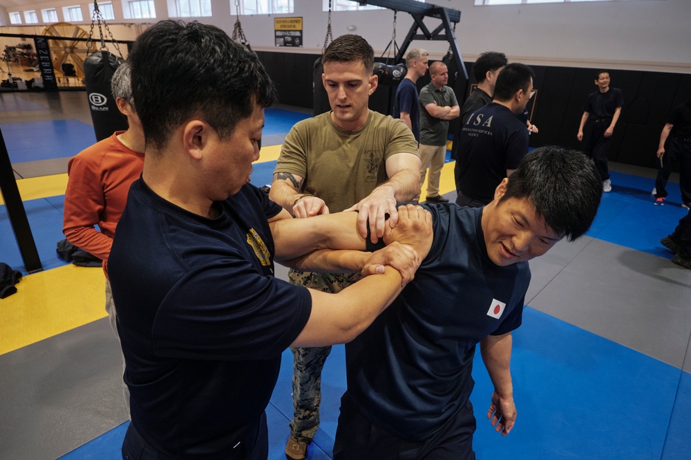 FASTPAC Marines, Immigration Agents participate in martial arts exchange
