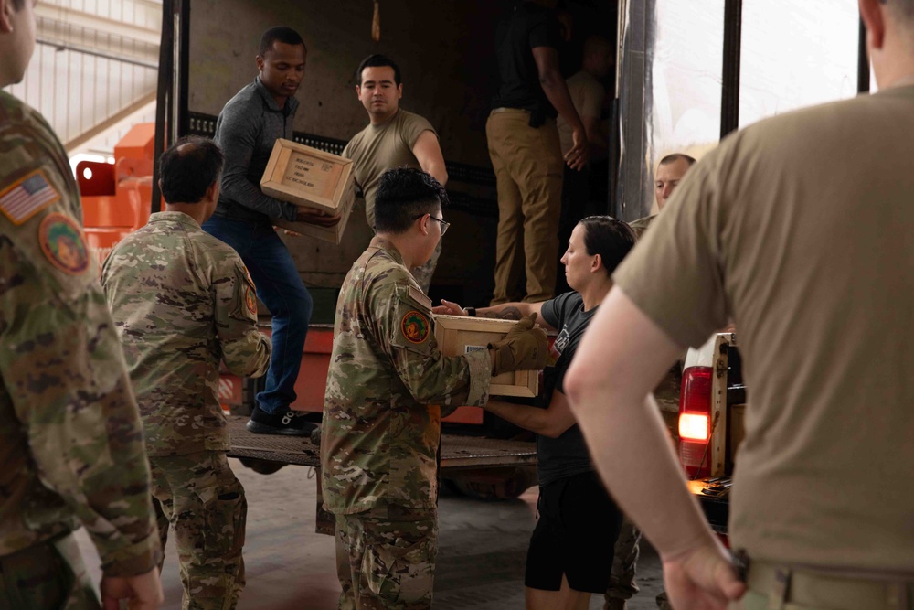 U.S. Army Soldiers and U.S. AirForce Airmen Unload ammunition for African Lion 2024