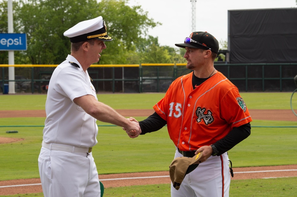 Capt. J. Patrick Thompson throws first pitch at Tides game