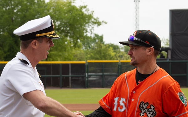 Capt. J. Patrick Thompson throws first pitch at Tides game