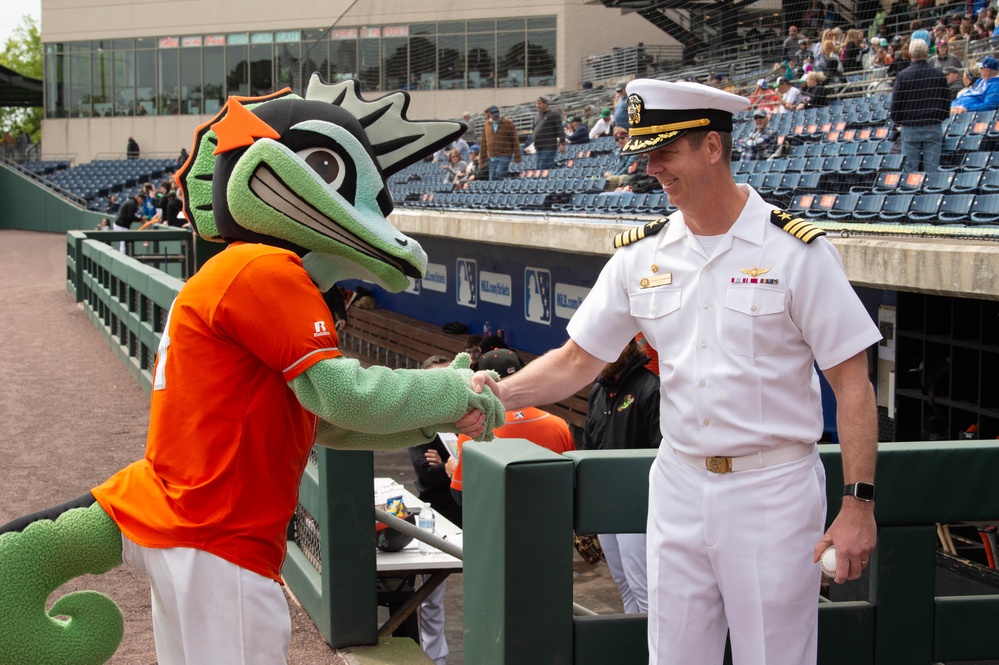Capt. J. Patrick Thompson throws first pitch at Tides game