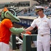 Capt. J. Patrick Thompson throws first pitch at Tides game
