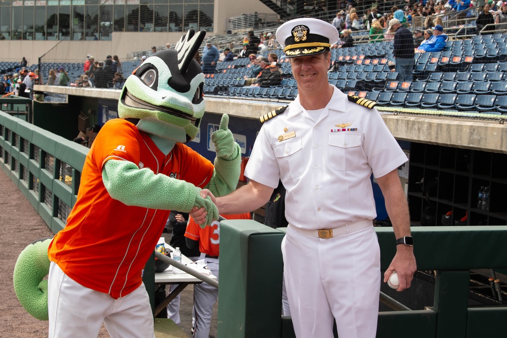 Capt. J. Patrick Thompson throws first pitch at Tides game