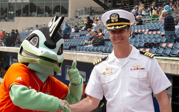 Capt. J. Patrick Thompson throws first pitch at Tides game