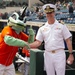 Capt. J. Patrick Thompson throws first pitch at Tides game