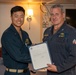 Lt. j.g. Joo recives his SWO pin